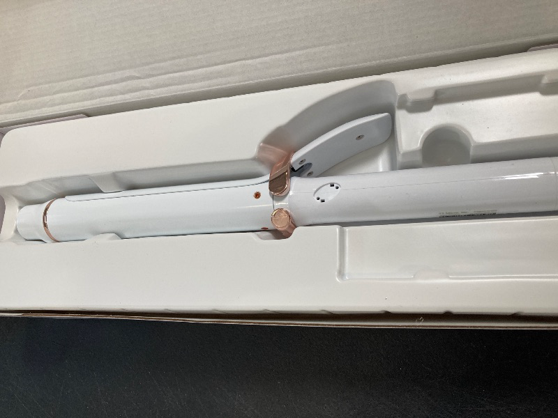 Photo 1 of T3 SinglePass Curl X Extra-Long Barrel Curling Iron with 9 Heat Settings and Ceramic Barrel for Fast Styling and Lasting Results on All Hair Types