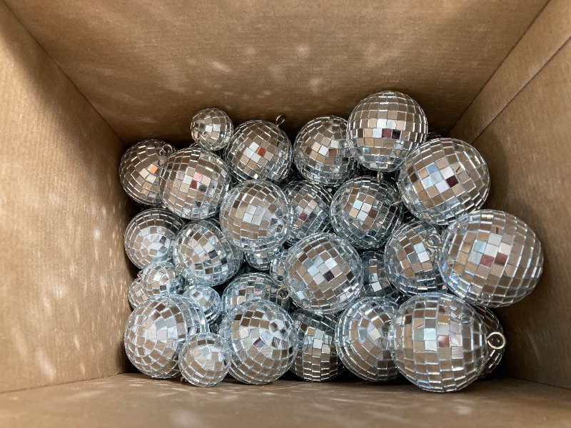 Photo 1 of Hoolerry 200 Pcs Mini Mirror Disco Ball Ornaments Mardi Gras Small Silver Hanging Decorations Reflective Tiny Balls Bulk for 70s 80s 90s Disco Themed Party (2'', 1'')