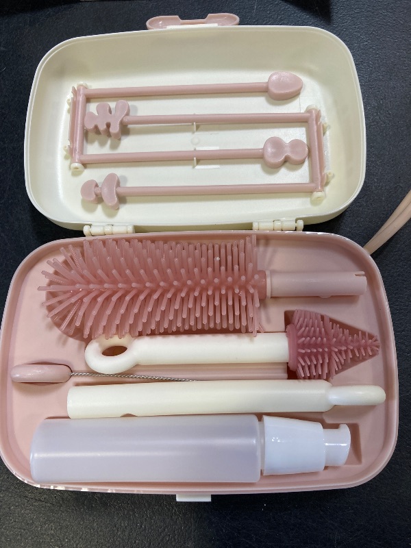 Photo 1 of Momcozy Bottle Brush Set - Baby Bottle Cleaner Kit with Silicone Brush, Nipple Brush, Straw Brush, Soap Dispenser, Drying Rack - 7 in 1 Bottle Cleaning Tool for Home and Travel, Pink