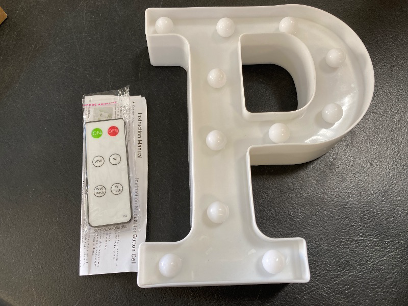 Photo 1 of HXWEIYE Light Up Letters P, LED Marquee Letters Sign 26 Alphabet and 10 Number Big Lights for Party Birthday Bar Battery Powered Christmas Decor (Warm White)