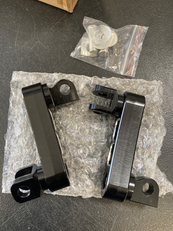 Photo 1 of HCmotorku Adjustable Footpegs Highway Pegs Male Mount Foot Peg Clamp Support Extensions Bracket Fit For Harley Sportster Dyna Softail Touring Road King Street Glide Road Glide (Black White)