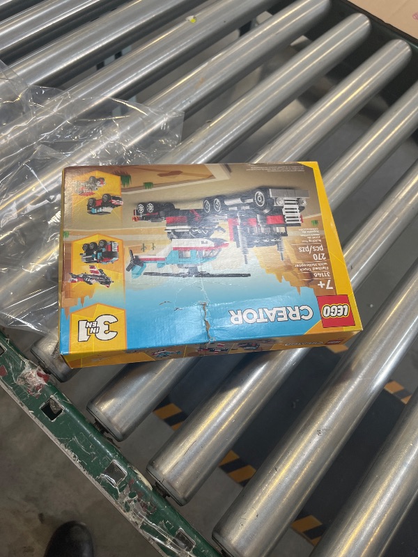 Photo 1 of LEGO Creator 3 in 1 Flatbed Truck with Helicopter Toy, Transforms from Flatbed Truck Toy to Propeller Plane to Hot Rod and SUV Car Toys, Gift Idea for Boys and Girls Ages 7 Years Old and Up, 31146