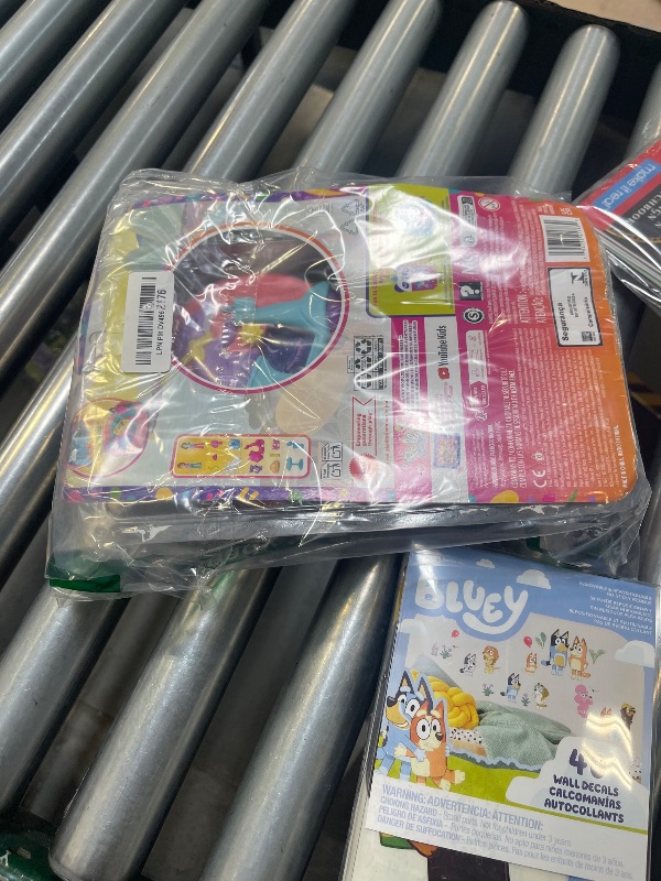 Photo 1 of Polly Pocket Dolls & Playset, Adventure Moped Compact, Travel Toy with 2 Micro Dolls & Pet, Plus Animal & Vehicle Accessories