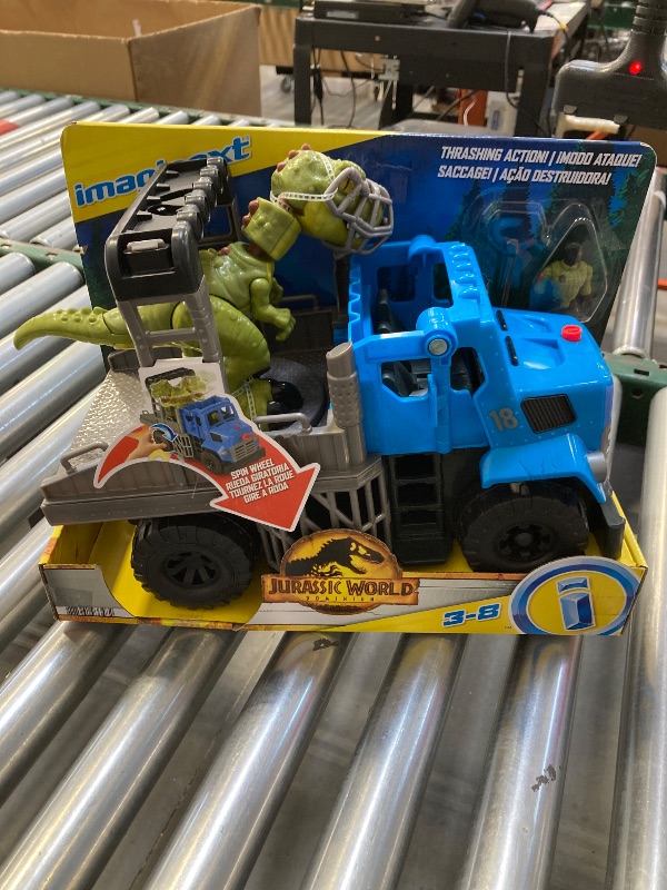 Photo 1 of Fisher-Price Imaginext Jurassic World Dominion Toy, Break Out Dino Hauler Vehicle & T. rex Dinosaur for Preschool Kids Ages 3+ Years