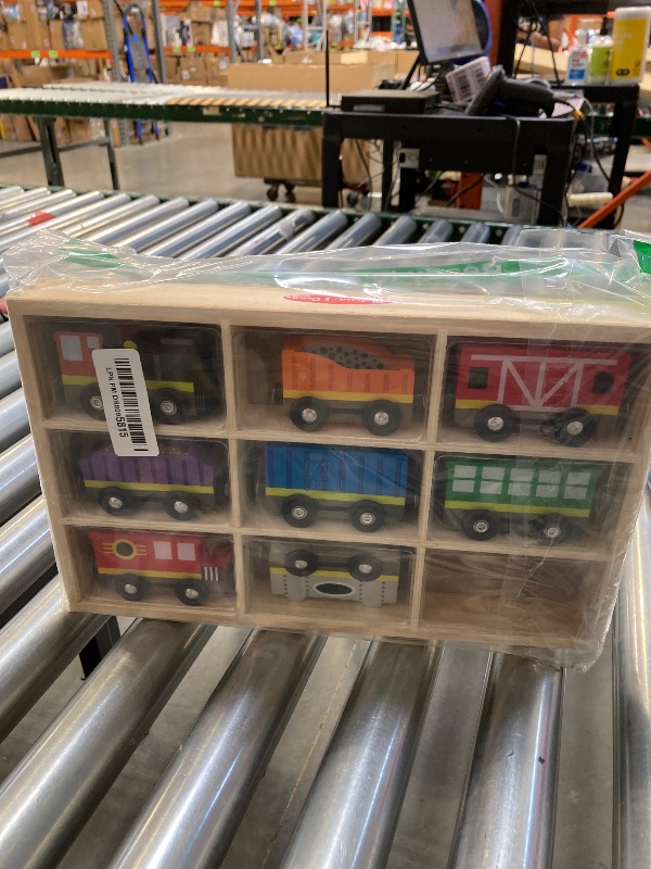 Photo 1 of Melissa & Doug Wooden Magnetic Train Cars - 8 Piece Educational and Skill-Building Wooden Toy for Boys and Girls Magnetic Train, For Toddlers And Kids Ages 3+