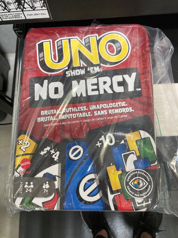 Photo 1 of Mattel Games UNO Show ‘em No Mercy Card Game in Storage & Travel Tin for Kids, Adults & Family Night with Extra Cards, Special Rules & Tougher Penalties 