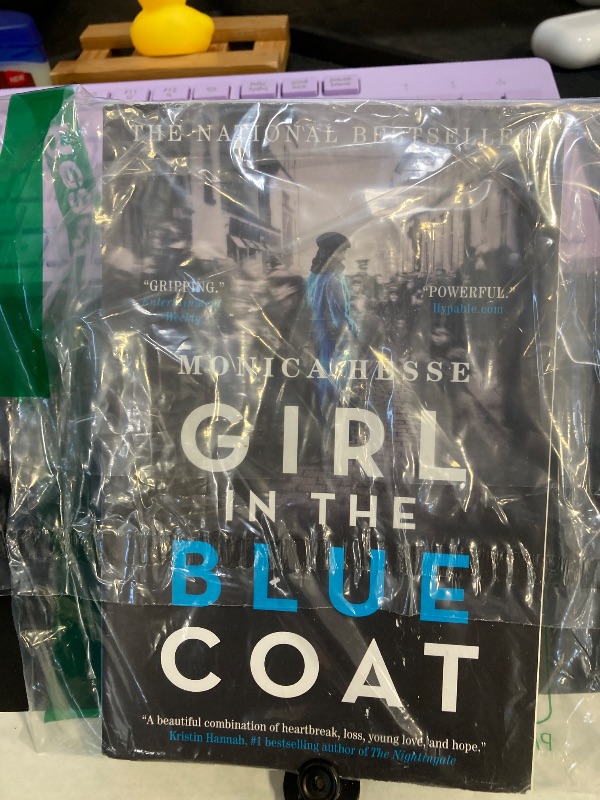 Photo 1 of Girl in the Blue Coat