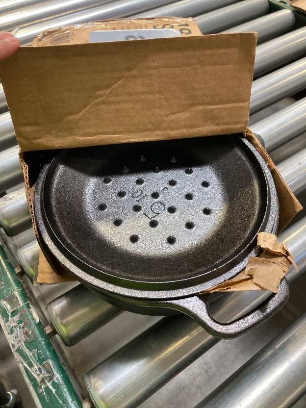 Photo 1 of Lodge 2 Quart Pre-Seasoned Cast Iron Dutch Oven with Lid - Dual Handles - Use in the Oven, on the Stove, on the Grill or over the Campfire - Black