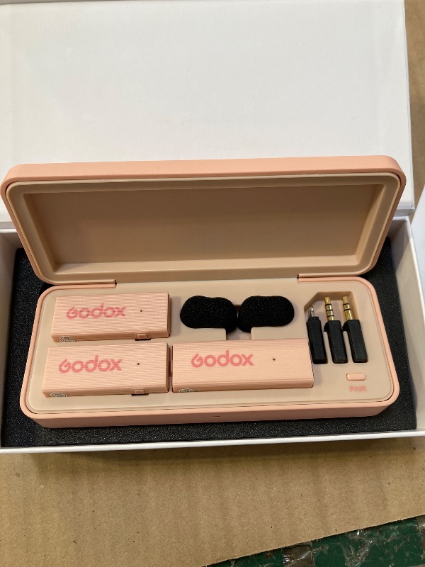 Photo 1 of GODOX Movelink Mini LT Kit Wireless Microphone System, 2.4GHz Lavalier Mic 100m(328ft.) Range with Charging Case for iPhone, Camera, Vlogger, Youtuber, Interviewer(Pink)
