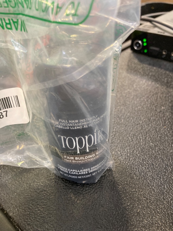 Photo 1 of Toppik Hair Building Fibers, Medium Brown, 12g Fill In Fine or Thinning Hair Instantly Thicker, Fuller Looking Hair 9 Shades for Men & Women