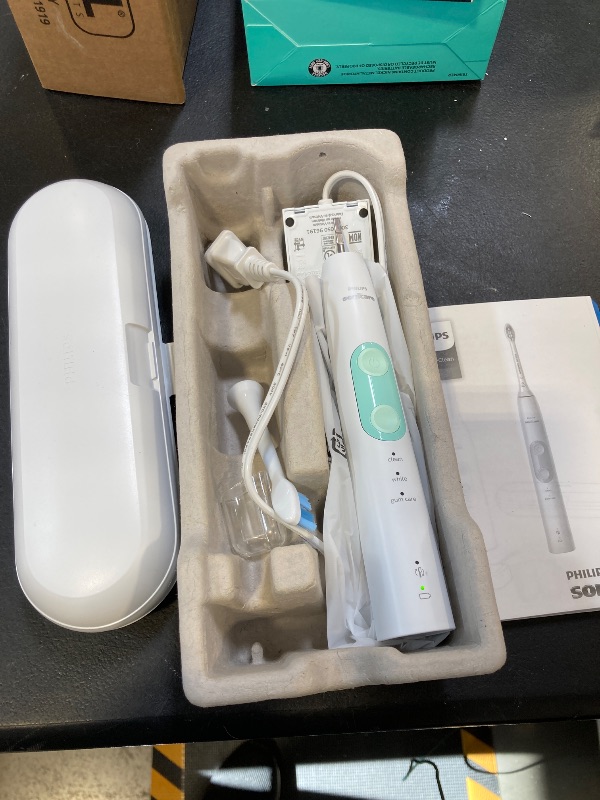 Photo 1 of Philips Sonicare ProtectiveClean 5100 Rechargeable Electric Toothbrush, with Pressure Sensor, 3 Cleaning Modes, SmarTimer and QuadPacer, 14-Day Battery Life, Travel Case, White, Model HX6857/11