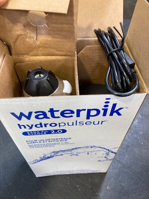 Photo 1 of Waterpik Cordless Advanced 2.0 Water Flosser For Teeth, Gums, Braces, Dental Care With Travel Bag and 4 Tips, ADA Accepted, Rechargeable, Portable, and Waterproof, Black WP-582, Packaging May Vary
