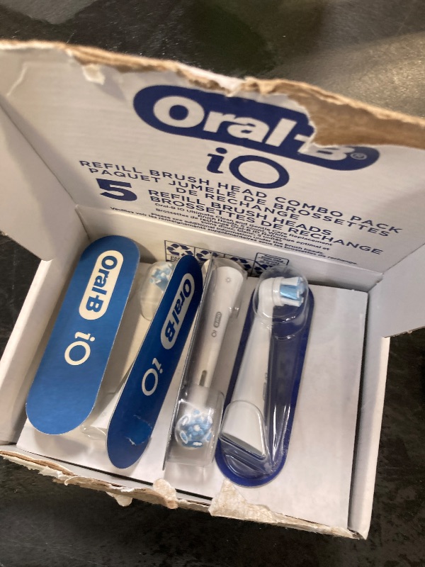 Photo 1 of Oral-B iO Ultimate Clean Replacement Brush Heads, 5 Count, 4 Ultimate Clean + 1 Gum & Sensitive White
