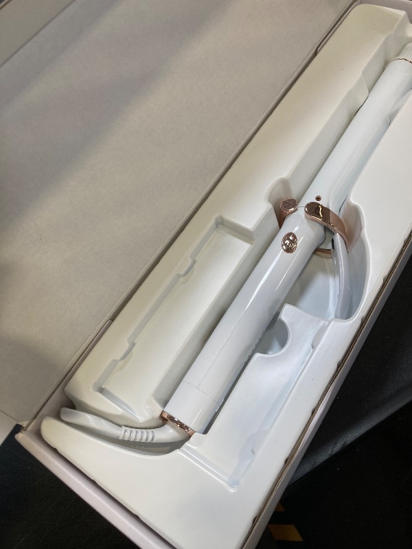 Photo 1 of T3 SinglePass Curl X Extra-Long Barrel 1", 1.25", 1.5" Curling Iron with 9 Heat Settings and Ceramic Barrel for Fast Styling and Lasting Results on All Hair Types