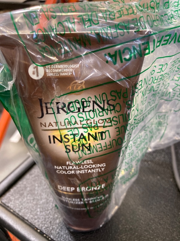 Photo 1 of Jergens Natural Glow Instant Sun Tanning Moisturizer + Bronzer, Lightweight Sunless Tanning for Natural-Looking Color, Deep Bronze, 6 Oz