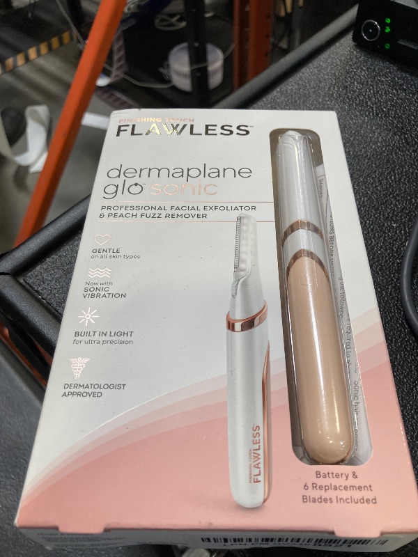 Photo 1 of Finishing Touch Flawless Dermaplane Glo Sonic Lighted Facial Exfoliator, Electric Vibrating Dermaplane Razor for Dermaplaning, Facial Hair Removal, 6 Replacement Heads