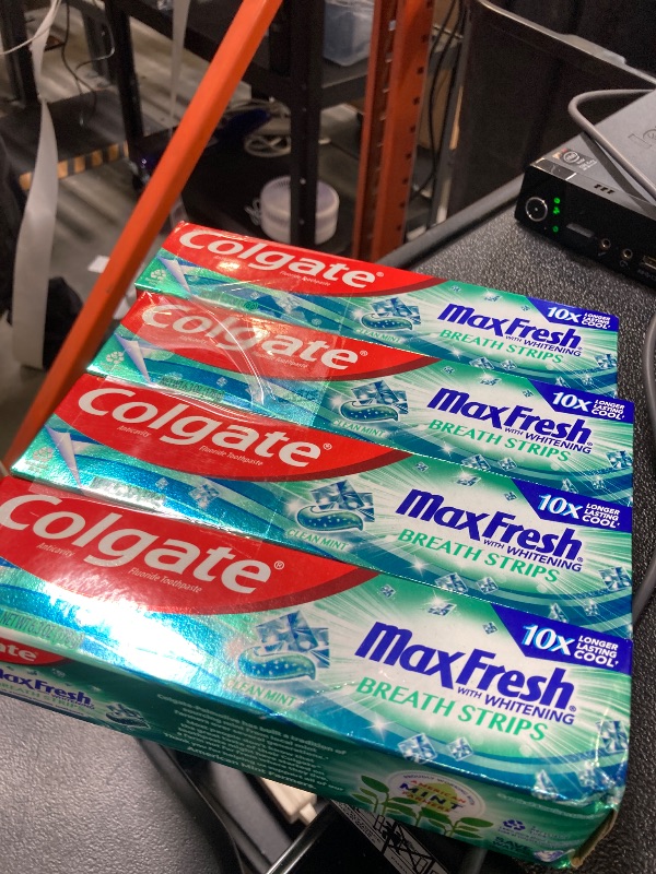 Photo 1 of Colgate Max Fresh Whitening Toothpaste with Mini Strips, Clean Mint Toothpaste for Bad Breath, Helps Fight Cavities, Whitens Teeth, and Freshens Breath, 6.3 Ounce (Pack of 4)