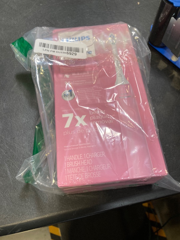 Photo 1 of Philips Sonicare 4100 Rechargeable Electric Toothbrush, with Pressure Sensor, 2 Intensity Settings, SmarTimer and QuadPacer, 14-Day Battery Life, Deep Pink, Model HX3681/26