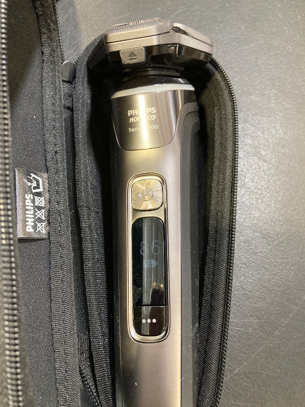 Photo 1 of Philips Norelco Shaver Series 9000, Wet and Dry Electric Shaver, with Lift & Cut Shaving System and SenseIQ Technology, Pop-up Trimmer, Cleaning Pod, Charging Stand and Travel Case, Model S9987/85
