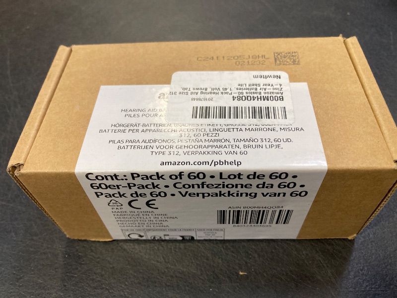 Photo 1 of Amazon Basics 60-Pack Hearing Aid Size 312 Zinc-Air Batteries, 1.45 Volt, Brown Tab, 4-Year Shelf Life, Child-Safe Package (Use Scissors to Open)