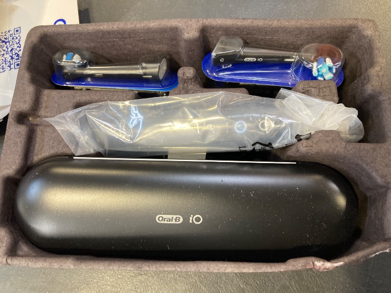 Photo 1 of Oral-B iO Series 9 Electric Toothbrush with 3 Replacement Brush Heads, Black Onyx