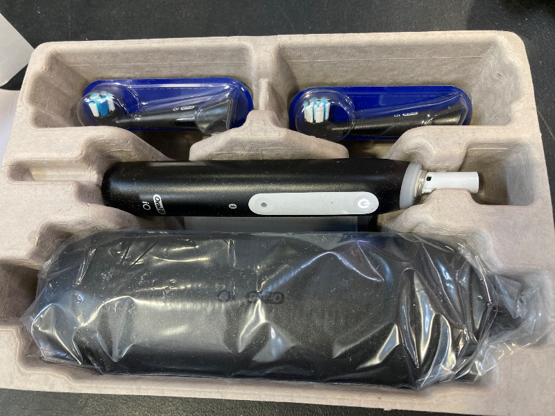 Photo 1 of Oral-B iO Deep Clean Rechargeable Electric Powered Toothbrush, Black with iO Series 3 Limited, 2 Brush Heads and Travel Case - Pressure Sensor to Protect Gums - 3 Cleaning Settings - 2 Minute Timer