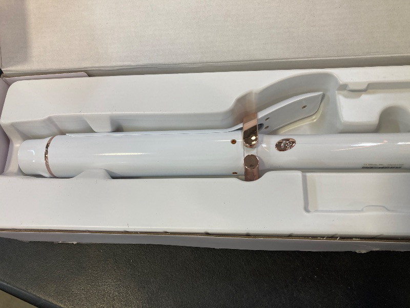 Photo 1 of T3 SinglePass Curl X Extra-Long Barrel Curling Iron with 9 Heat Settings and Ceramic Barrel for Fast Styling and Lasting Results on All Hair Types