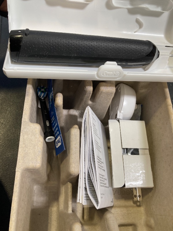 Photo 1 of Oral-B Genius X Limited Rechargeable Electric Toothbrush with 1 Replacement Brush Head, Travel Case, Midnight Black