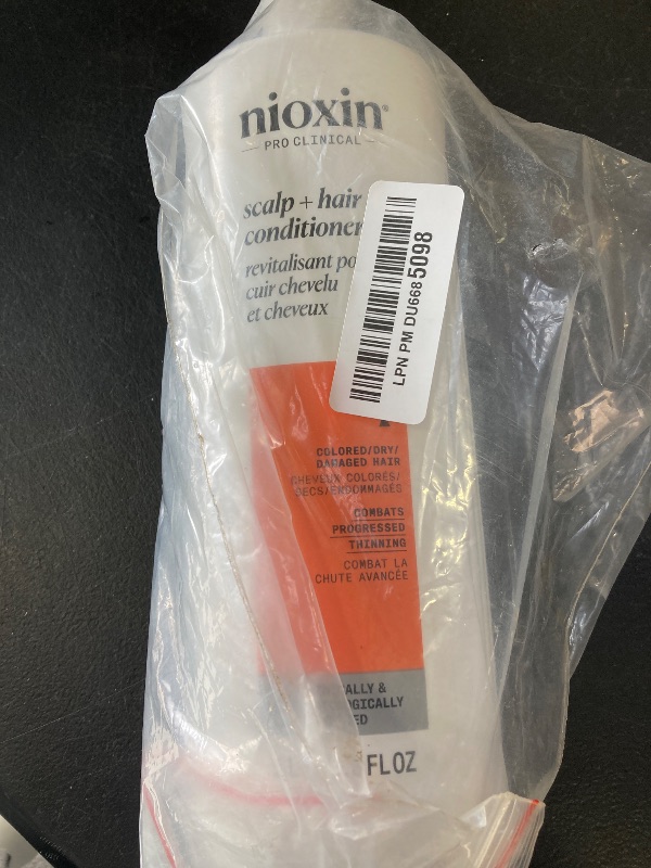 Photo 1 of Nioxin System 4 Scalp + Hair Conditioner | For Colored or Damaged Hair with Progressed Thinning | With Niacinamide and Biotin | 33.8 Fl oz.