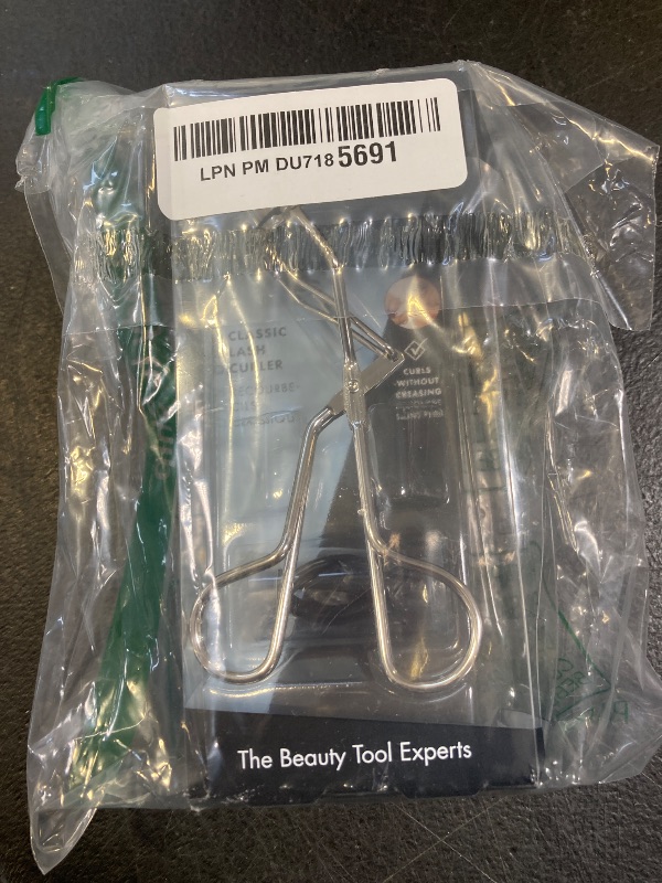 Photo 1 of Tweezerman Classic Eyelash Curler Model No. 1034-R, Stainless Steel