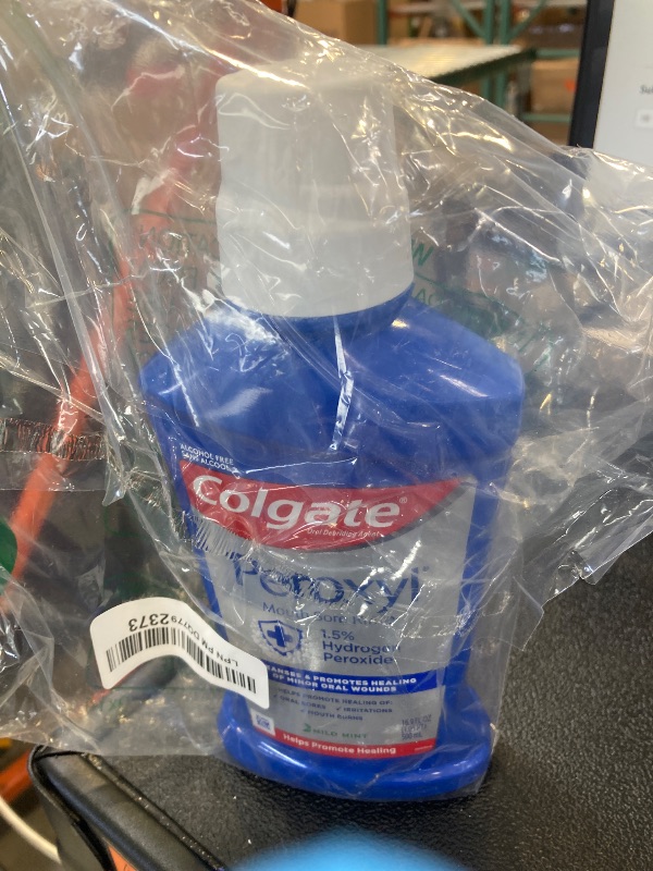 Photo 1 of Colgate Peroxyl Antiseptic Mouthwash and Mouth Sore Rinse, 1.5% Hydrogen Peroxide, Mild Mint - 500ml, 16.9 Fluid Ounces
