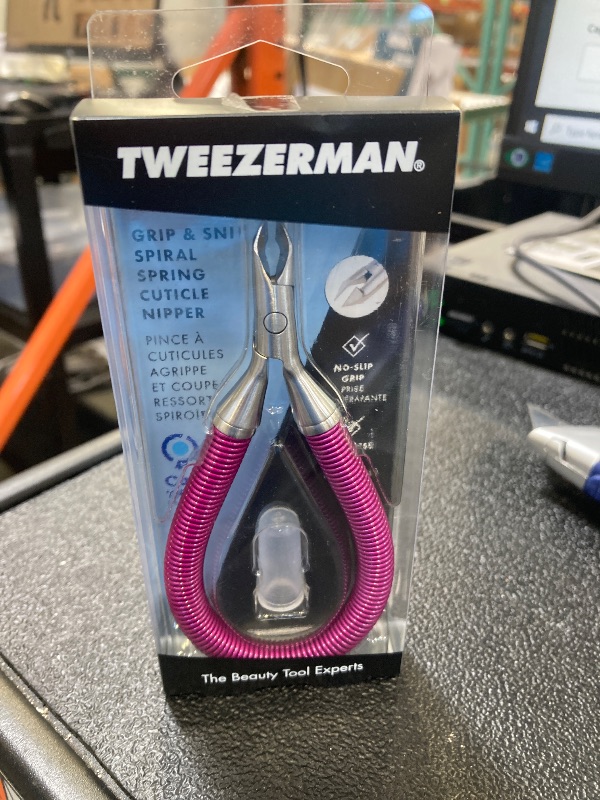 Photo 1 of Tweezerman Grip & Snip Spiral Spring Cuticle Nipper Assorted Colors, Blue/Pink, 2.5 x 1 x 6"