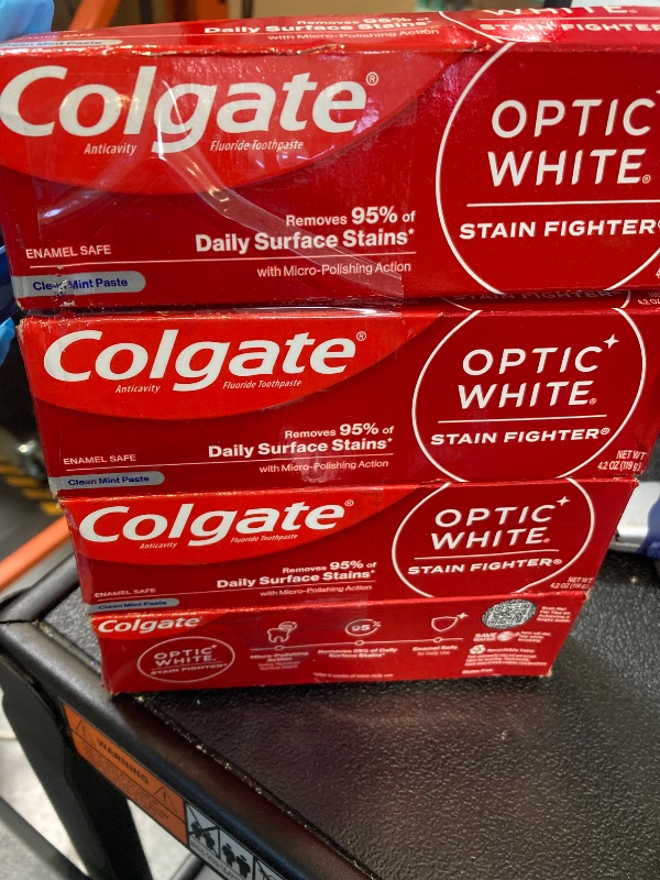 Photo 1 of Colgate Optic White Stain Fighter Teeth Whitening Toothpaste, Anticavity Fluoride Toothpaste for Whitening Teeth, Helps Remove Daily Surface Stains, Clean Mint Paste, 4 Pack, 4.2 oz