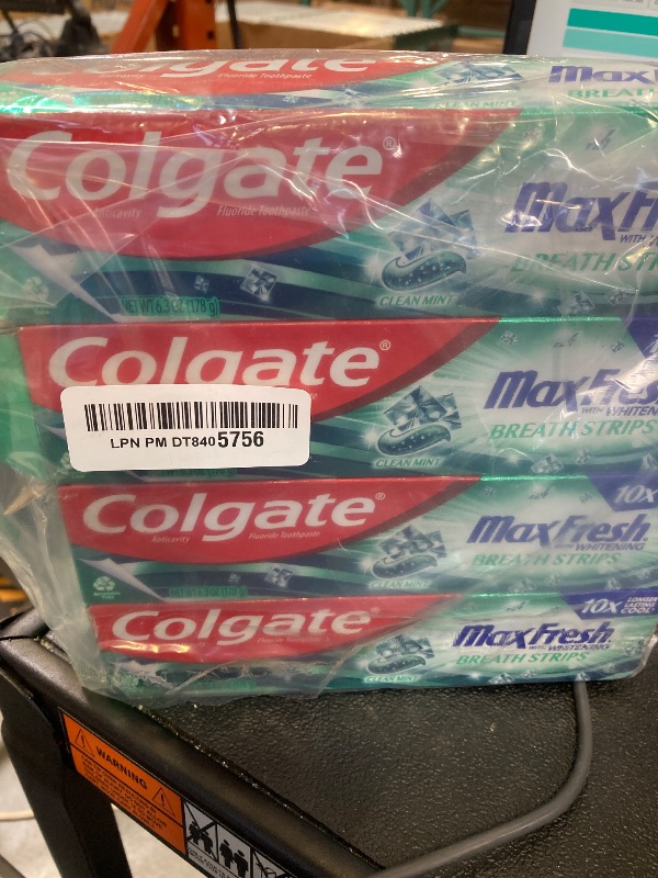 Photo 1 of Colgate Max Fresh Whitening Toothpaste with Mini Strips, Clean Mint Toothpaste for Bad Breath, Helps Fight Cavities, Whitens Teeth, and Freshens Breath, 6.3 Ounce (Pack of 4)