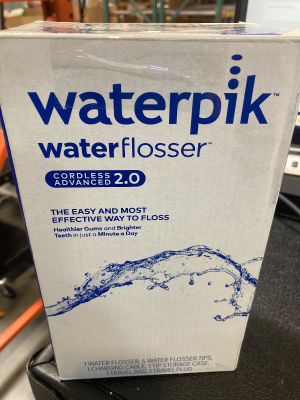 Photo 1 of Waterpik Cordless Advanced 2.0 Water Flosser For Teeth, Gums, Braces, Dental Care With Travel Bag and 4 Tips, ADA Accepted, Rechargeable, Portable, and Waterproof, White WP-580, Packaging May Vary