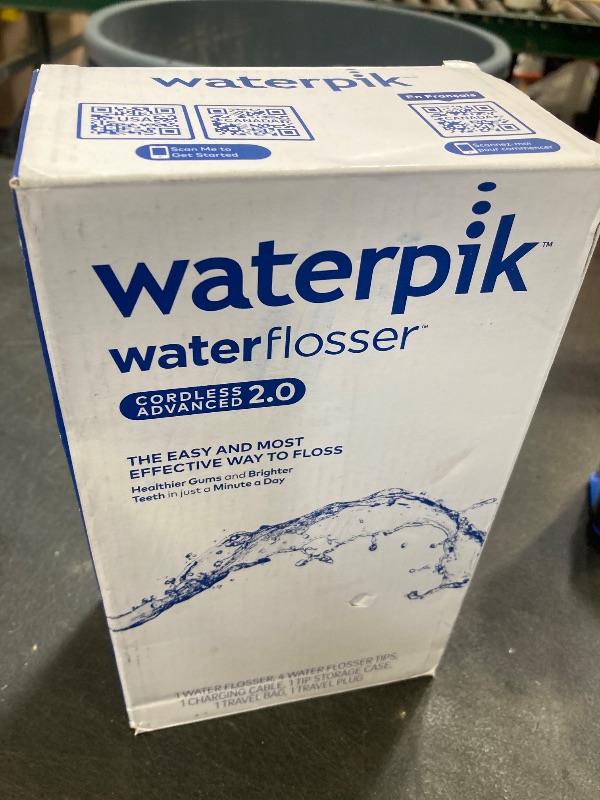 Photo 1 of Waterpik Cordless Advanced 2.0 Water Flosser For Teeth, Gums, Braces, Dental Care With Travel Bag and 4 Tips, ADA Accepted, Rechargeable, Portable, and Waterproof, White WP-580, Packaging May Vary