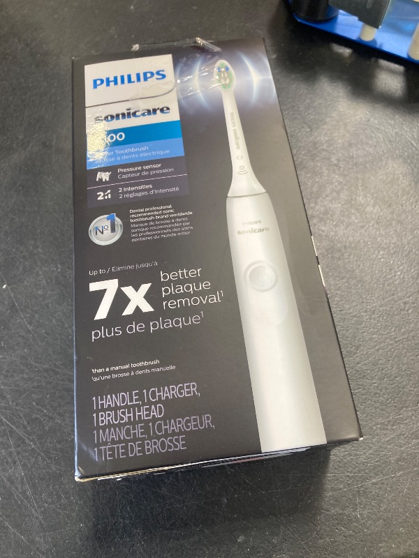 Photo 1 of Philips Sonicare 4100 Rechargeable Electric Toothbrush, with Pressure Sensor, 2 Intensity Settings, SmarTimer and QuadPacer, 14-Day Battery Life, White, Model HX3681/23