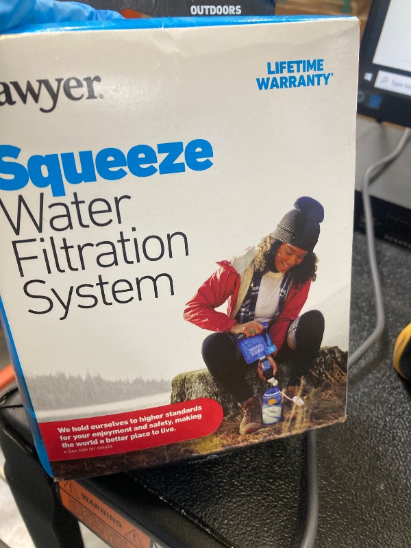 Photo 1 of Sawyer Products SP129 Squeeze Water Filtration System w/ Two 32-Oz Squeeze Pouches, Straw, and Hydration Pack Adapter