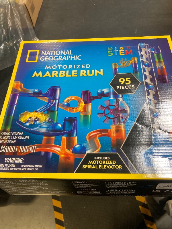 Photo 1 of NATIONAL GEOGRAPHIC Marble Run with Motorized Elevator - 95-Piece Marble Maze Kit with Motorized Spiral Lift, 20 Marbles, Storage Bag & More, Perpetua