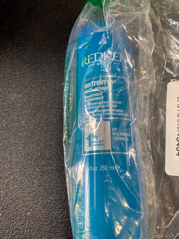 Photo 1 of Redken Extreme Anti-Snap Anti-Breakage Leave-In Treatment For Distressed Hair - Fortifies & Helps Reduce Breakage, Infused With Proteins