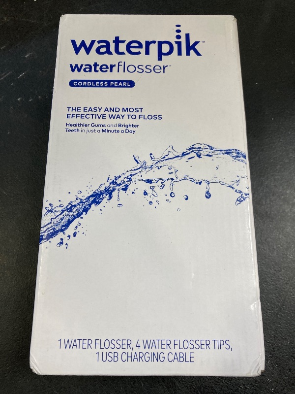 Photo 1 of Waterpik Cordless Pearl Rechargeable Portable Water Flosser for Teeth, Gums, Braces Care and Travel with 4 Flossing Tips - ADA Accepted, WF-13 Black, Packaging May Vary