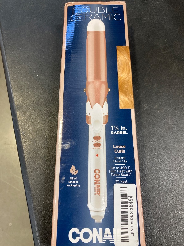 Photo 1 of Conair Double Ceramic 1 1/4-Inch Curling Iron, 1 ¼ inch barrel produces loose curls – for use on medium and long hair