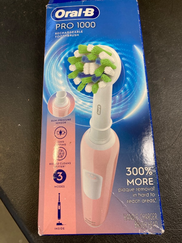 Photo 1 of Oral-B Pro 1000 Rechargeable Electric Toothbrush, Pink