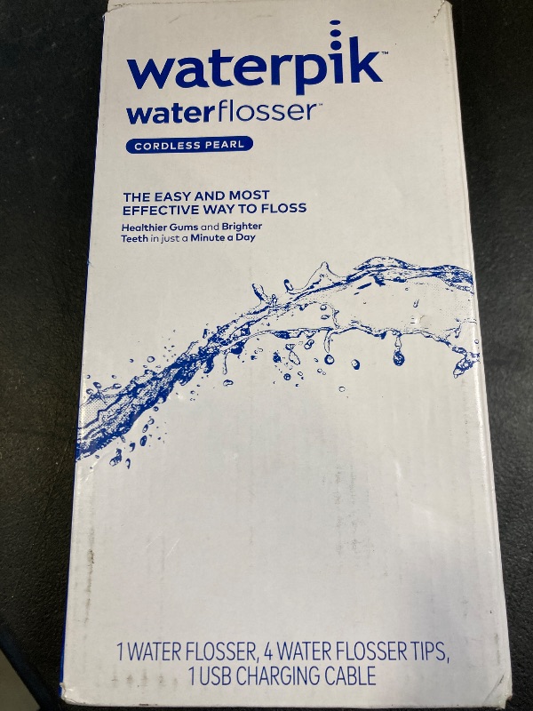 Photo 1 of Waterpik Cordless Pearl Rechargeable Portable Water Flosser for Teeth, Gums, Braces Care and Travel with 4 Flossing Tips - ADA Accepted, WF-13 White, Packaging May Vary