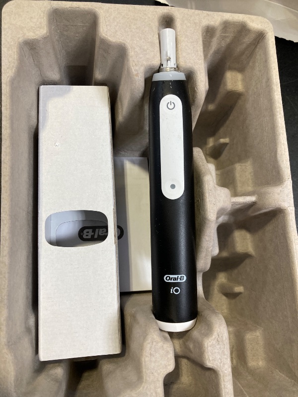 Photo 1 of Oral-B iO Deep Clean + Whiten Rechargeable Electric Toothbrush with Visible Pressure Sensor, 2 Minute Timer, 5 Cleaning Settings, 1 iO5 Limited, 3 Toothbrush Heads, Travel Case & Refill Holder, Black