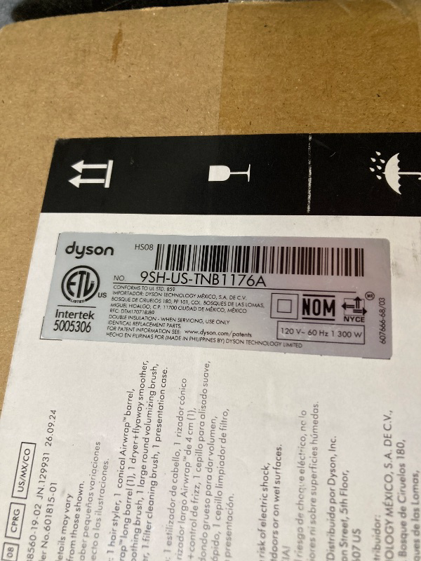 Photo 1 of Dyson Airwrap i.d.™ Multi - Styler and Dryer Straight + Wavy in Ceramic Pink and Rose Gold