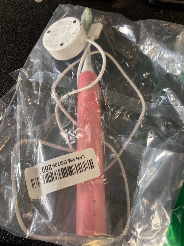 Photo 1 of Philips Sonicare 4100 Rechargeable Electric Toothbrush, with Pressure Sensor, 2 Intensity Settings, SmarTimer and QuadPacer, 14-Day Battery Life, Deep Pink, Model HX3681/26