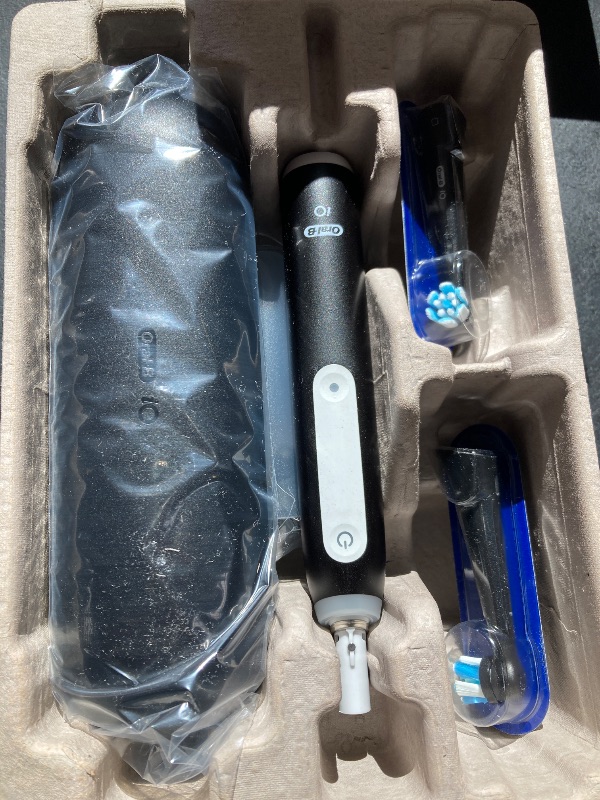 Photo 1 of Oral-B iO Deep Clean Rechargeable Electric Powered Toothbrush, Black with iO Series 3 Limited, 2 Brush Heads and Travel Case - Pressure Sensor to Protect Gums - 3 Cleaning Settings - 2 Minute Timer
