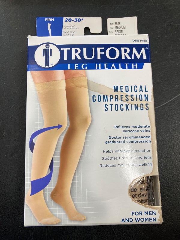 Photo 1 of Truform 20-30 Mmhg Compression Stockings for Men & Women, Thigh High Length, Dot Top, Closed Toe, Beige, Medium
