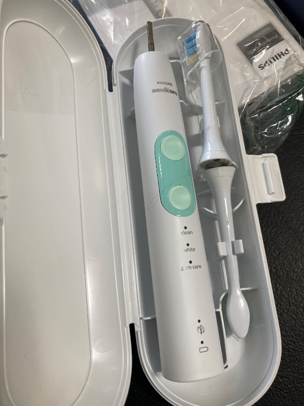 Photo 1 of Philips Sonicare ProtectiveClean 5100 Rechargeable Electric Toothbrush, with Pressure Sensor, 3 Cleaning Modes, SmarTimer and QuadPacer, 14-Day Battery Life, Travel Case, White, Model HX6857/11